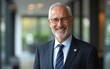 © Michael - Happy senior businessman. High quality