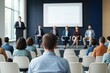 © Tanakorn - Professional audience member attentively listens to a diverse business panel presenting innovative ideas at a corporate conference in a modern, bright auditorium