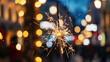 © Milos - A sparkler emits dazzling sparks, illuminating the night with a magical glow, embodying celebration and the joyous moments shared with loved ones during festive occasions.