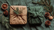 © Oksana - Zero waste Christmas gifts wrapped in kraft paper and green fabric, adorned with natural elements like pine and dried orange, creating a sustainable holiday atmosphere