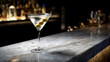 © sornram - A classic martini with olives, set against a dimly lit bar ambiance.