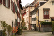 Charming Narrow Street with Colorful Shutters in Historic European Town Bregenz