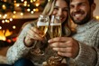© Dusan - Couple celebrating holidays cheering champagne by fireplace