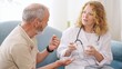 © DMegias - Female doctor explaining medicine to senior patient at home
