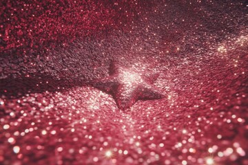 A single red glitter star rests on a textured surface covered in shimmering red glitter and bokeh lights