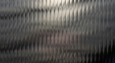 Abstract background with a wavy pattern and a metallic, reflective surface