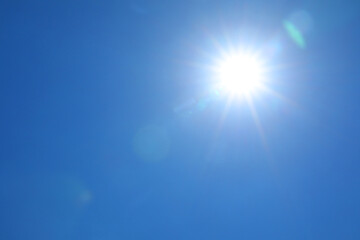 Wall Mural - bright sun on clear blue sky. good weather