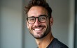© Joseph - Smiling man wearing eyeglasses. High quality
