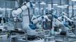 © Gorodenkoff - Innovative Manufacturing Factory with Industrial Robots Producing Circuit Boards in an Automated Factory. Advanced Facility Building Microelectronics Components with Robotic Arms