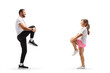 © Ljupco Smokovski - Full length profile shot of a sports coach exercising with a girl and stretching knees