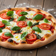 © Sumanta - pizza with salami tomatoes and olives. pizza on a wooden table. Fresh margherita pizza with tomatoes and basil on wooden table.