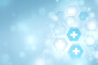 © Phatcharaphon - Digital Healthcare Hexagons: A sophisticated array of luminous, hexagonal shapes forms a cutting-edge digital healthcare concept on a serene backdrop.
