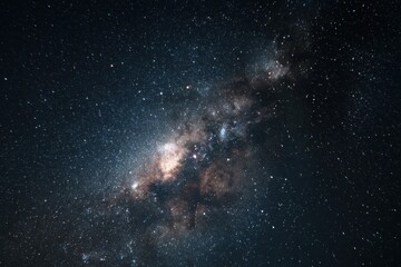 Wall Mural - Vast expanse of dark interstellar space showcasing a vibrant galaxy filled with stars and cosmic dust swirling amid the universe's wonders