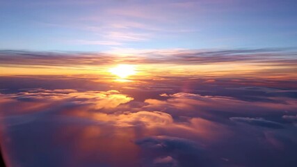 Wall Mural - dynamic cloudscape sunrise timelapse with fast-moving clouds illuminated by morning sun background, 