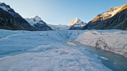Wall Mural - ﻿Majestic glacier slowly melts, revealing intricate ice patterns under changing sunlight in a high-altitude timelapse glacier, melting, environment