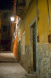 Walking through the nighttime colonial streets of Guanajuato, Mexico, architecture and buildings 
