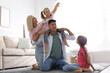 © New Africa - Happy family spending time together at home