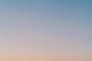 Wall Mural - Clear blue sky at dawn or dusk serving as a natural backdrop for artistic decoration.