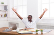© Prostock-studio - Happy excited businessman celebrate. Winner, black man in office with laptop