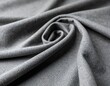 © Voli - Gray fabric draped in a spiral