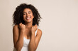 © Prostock-studio - Happy pretty black girl celebrating her success on light background, copy space
