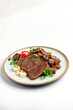 © Jahid Hasan Rabbi - Gourmet Roast Beef Slices on Rice with Herb Garnish