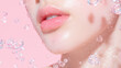 © Kanchanit - Close up of woman lips with dewy, glowing appearance, surrounded by bubbles against soft pink background. image conveys freshness and beauty, highlighting smooth skin and hydration