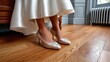 © Guntur - Elegant light beige high heels with rhinestone embellishments