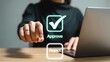 © SD AI - Woman using laptop with approve and reject button on virtual screen