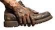 © Linda - Mudcovered hand gripping a muddy boot showing rugged use and dirt