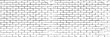 © Sharmin - Black and white seamless pattern with realistic brick wall. Abstract vector texture in the grunge style with old horizontal brickwork. Relief repeating background,