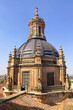 Salamanca University with its historic facade and ornate Plateresque architecture under a bright sky in Salamanca, Spain
