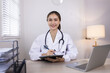 © SOMKID - Medical professional using a computer for online patient support, Medical professional and Healthcare technology Concept.