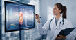 © SOMKID - Medical professional interacting with a futuristic interface showing patient health data.