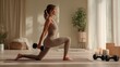 © ekarat - Fit Woman Practicing Yoga with Dumbbells in Modern Studio
