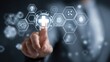 © abdul - A finger points to a central cross within a network of glowing hexagonal icons, representing healthcare technology and digital innovation