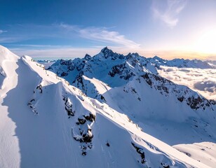 Wall Mural - Aerial View of Snow Covered Mountain Range at Sunset