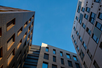 Geometric architecture in Oslo Norway with converging facades, clarity and copy space background for corporate branding, editorial layouts and urban design