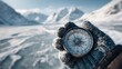 © Stitch - Snow-covered landscape features a person holding a compass near a frozen lake in the mountains during winter