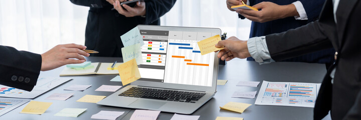 Wall Mural - Project planning software for brisk business project management on the computer screen showing timeline chart of the team project