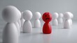 © MMerellinn - A sad red figure stands alone amidst a crowd of white figures, symbolizing exclusion, social isolation, and the pain of being different or targeted within a group setting of mistreatment.