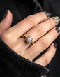 © Komanda - Close-up of a gold ring on a hand