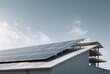 © AndyAziz - Industrial building with solar panels installed on sloped metal roof under cloudy sky