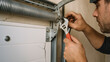 © AiDesign - technician repairing garage door spring with wrench tool in maintenance service workshop ensuring mechanical adjustment and safety repair process in residential garage setting
