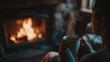 © Aliaksandr - A young woman with dark hair sits by a cozy fireplace, holding a steaming cup. The warm glow of the fire creates a relaxing atmosphere.