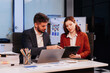 © NINENII - Project manager working overtime and update tasks with milestones progress planning and professional investor working new start up project in the office.