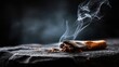 © Vanessa - Crushed cigarette with smoke on dark textured surface, close-up dramatic lighting, symbol of quitting smoking and health awareness.