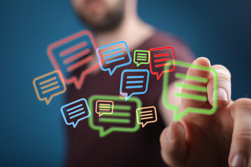 Man interacting with holographic message icons. Modern communication concept for social media and networking. Technology and connection.
