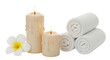 © Maelle - Isolated spa still life with candles, frangipani blossom and towels for relaxation session