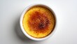 © Judith - Classic French Creme Brulee Dessert In White Ramekin With Caramelized Sugar Crust Creamy Custard And Vanilla Flavor On White Background